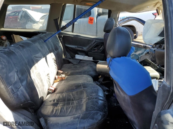 2003 Jeep Grand Cherokee Laredo with VIN 1J4GW48S93C591873, listed as a Copart auction lot 46839785 with 221,922 mi miles and Salvage Title. Bid and sale history available at carsss.com. Image 11.