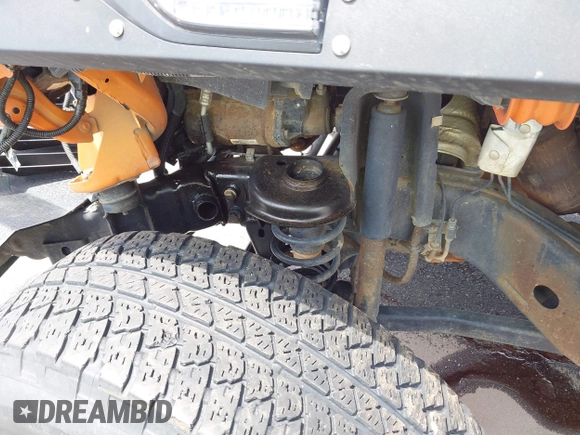 2013 Jeep Wrangler Sport z VIN 1C4AJWAG2DL538526, wystawiony jako IAAI lot #42378501 z przebiegiem 81 709 mil mil oraz . Historia ofert i sprzedaży dostępna na DreamBid. Obrazek 22.