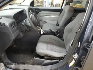 2007 Jeep Compass Sport with VIN 1J8FF47W87D130159, listed as a Copart auction lot 47032565 with 161,236 mi miles and Salvage Title. Bid and sale history available at carsss.com. Image 7.