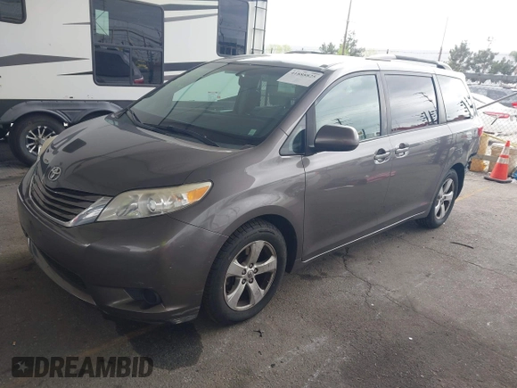 2015 Toyota Sienna LE AAS with VIN 5TDKK3DC8FS585957, listed as a IAAI auction lot 41888825 with 157,364 mi miles and . Bid and sale history available at DreamBid. Image 2.