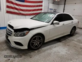 2016 Mercedes-Benz E 400 with VIN WDDHF6HB2GB170018, listed as a Copart auction lot 56477555 with 140,874 mi miles and Salvage title. Bid and sale history available at DreamBid. Image 1.