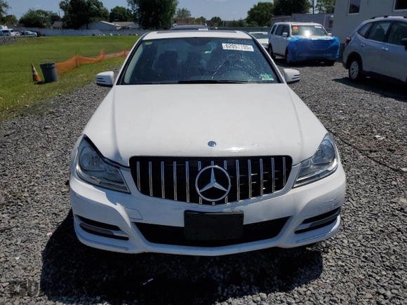 2014 Mercedes-Benz C 250 Sport with VIN WDDGF4HB1EG254153, listed as a Copart auction lot 62057195 with 94,752 mi miles and Salvage title. Bid and sale history available at DreamBid. Image 5.