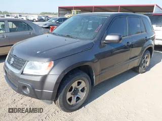 2012 Suzuki Grand Vitara Premium z VIN JS3TD0D22C4101455, wystawiony jako IAAI lot #42211776 z przebiegiem 153 569 mil mil oraz . Historia ofert i sprzedaży dostępna na DreamBid. Obrazek 2.