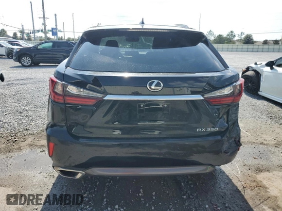 2018 Lexus RX 350 with VIN 2T2ZZMCA2JC110026, listed as a Copart auction lot 57908945 with 96,663 mi miles and Salvage title. Bid and sale history available at DreamBid. Image 6.