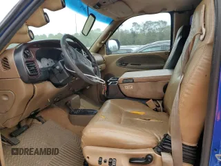1999 Dodge Ram 2500 with VIN 1B7KF2363XJ504002, listed as a Copart auction lot 73557954 with 297,618 mi miles and Salvage Title. Bid and sale history available at carsss.com. Image 7.