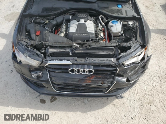 2014 Audi A6 Prestige z VIN WAUHGAFC8EN062243, wystawiony jako Copart lot #54622005 z przebiegiem 106 729 mil mil oraz Szkoda całkowita • Salvage title. Historia ofert i sprzedaży dostępna na DreamBid. Obrazek 11.