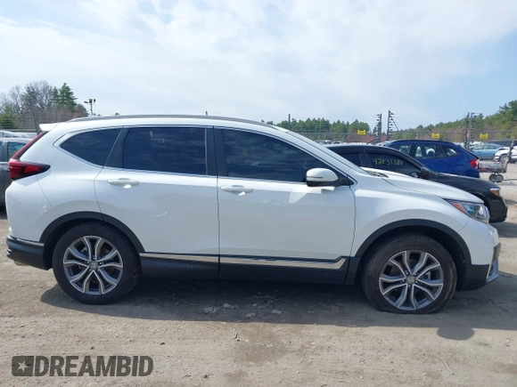 2020 Honda CR-V Touring z VIN 2HKRW2H9XLH623380, wystawiony jako IAAI lot #42039028 z przebiegiem 59 795 mil mil oraz . Historia ofert i sprzedaży dostępna na DreamBid. Obrazek 13.