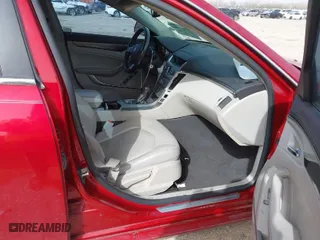 2009 Cadillac CTS RWD w/1SA with VIN 1G6DF577490135353, listed as a IAAI auction lot 41724476 with 128,062 mi miles. Bid and sale history available at carsss.com. Image 5.