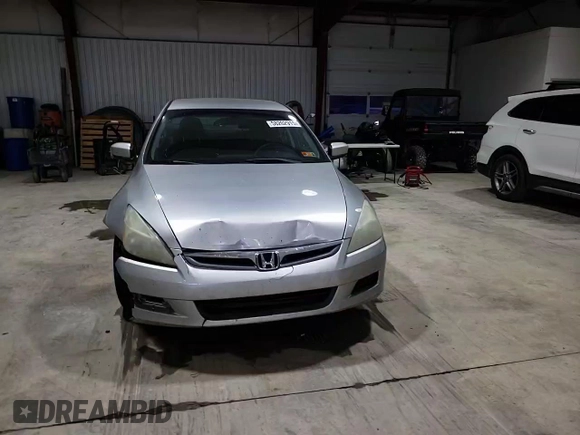 2007 Honda Accord LX z VIN 1HGCM564X7A108219, wystawiony jako Copart lot #58202915 z przebiegiem 184 839 mil mil oraz Szkoda całkowita • Salvage title. Historia ofert i sprzedaży dostępna na DreamBid. Obrazek 13.