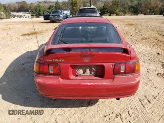 1994 Toyota Celica ST with VIN JT2AT00N6R0028351, listed as a Copart auction lot 80139234 with 219,786 mi miles and Salvage Title. Bid and sale history available at carsss.com. Image 6.