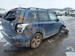 2014 Subaru Forester 2.5i Premium with VIN JF2SJAECXEH421197, listed as a IAAI auction lot 41642959 with 74,857 mi miles. Bid and sale history available at carsss.com. Image 4.