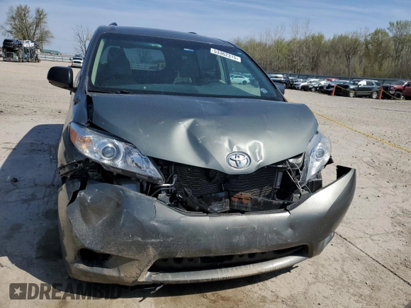2014 Toyota Sienna L z VIN 5TDZK3DC2ES418247, wystawiony jako Copart lot #53362315 z przebiegiem 165 120 mil mil oraz Szkoda całkowita • Salvage title. Historia ofert i sprzedaży dostępna na DreamBid. Obrazek 5.