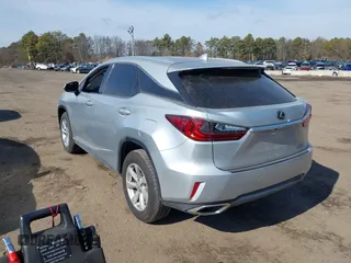 2017 Lexus RX with VIN 2T2BZMCA1HC080836, listed as a IAAI auction lot 41649014 with 68,933 mi miles. Bid and sale history available at carsss.com. Image 3.