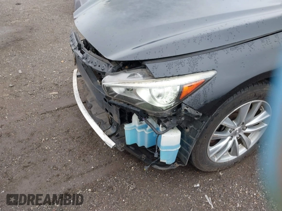 2014 Infiniti Q50 Premium z VIN JN1BV7AR2EM705630, wystawiony jako IAAI lot #42258650 z przebiegiem 109 151 mil mil oraz . Historia ofert i sprzedaży dostępna na DreamBid. Obrazek 19.