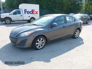 2011 Mazda 3 i Touring z VIN JM1BL1VF0B1900087, wystawiony jako IAAI lot #42462777 z przebiegiem 202 374 mil mil oraz . Historia ofert i sprzedaży dostępna na DreamBid. Obrazek 2.