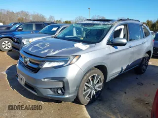2019 Honda Pilot Touring 7-Passenger with VIN 5FNYF6H60KB038846, listed as a IAAI auction lot 41339385 with Not provided miles and . Bid and sale history available at DreamBid. Image 17.