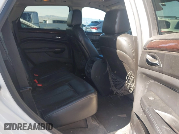 2012 Cadillac SRX Luxury Collection z VIN 3GYFNAE32CS518428, wystawiony jako IAAI lot #42153391 z przebiegiem 159 836 mil mil oraz . Historia ofert i sprzedaży dostępna na DreamBid. Obrazek 8.