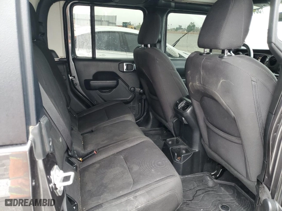 2023 Jeep Gladiator Freedom with VIN 1C6JJTAG9PL557861, listed as a Copart auction lot 50452955 with 44,716 mi miles and Salvage Title. Bid and sale history available at carsss.com. Image 10.