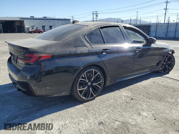 2023 BMW 5 Series M550i xDrive с VIN WBA13BK04PCM97306, выставлен на аукционе Copart как лот 76813754 с пробегом 19 259 миль миль и Списание • Salvage title. История ставок и продаж доступна на DreamBid. Изображение 3.