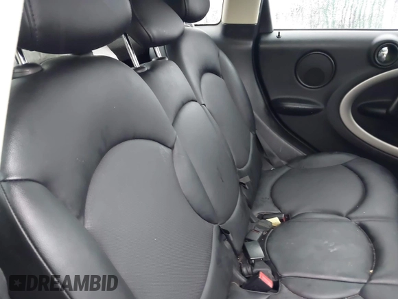 2015 MINI Countryman z VIN WMWZB3C59FWR43890, wystawiony jako IAAI lot #42372407 z przebiegiem 131 884 mil mil oraz . Historia ofert i sprzedaży dostępna na DreamBid. Obrazek 8.
