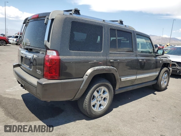 2006 Jeep Commander Limited with VIN 1J8HG58296C170911, listed as a Copart auction lot 59883355 with 112,860 mi miles and Salvage title. Bid and sale history available at DreamBid. Image 3.