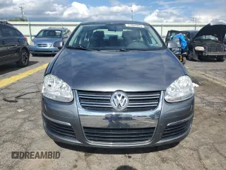 2009 Volkswagen Jetta SE with VIN 3VWRZ71K79M168084, listed as a Copart auction lot 57854825 with 150,986 mi miles and Salvage title. Bid and sale history available at DreamBid. Image 5.