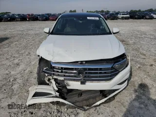 2019 Volkswagen Jetta SEL with VIN 3VWE57BU9KM047413, listed as a Copart auction lot 57221625 with 127,556 mi miles and Salvage title. Bid and sale history available at DreamBid. Image 5.