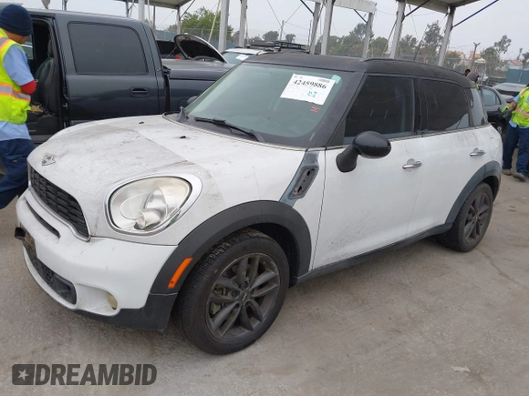 2011 MINI Countryman S with VIN WMWZC3C52BWL78647, listed as a IAAI auction lot 42459886 with 142,407 mi miles and . Bid and sale history available at DreamBid. Image 2.