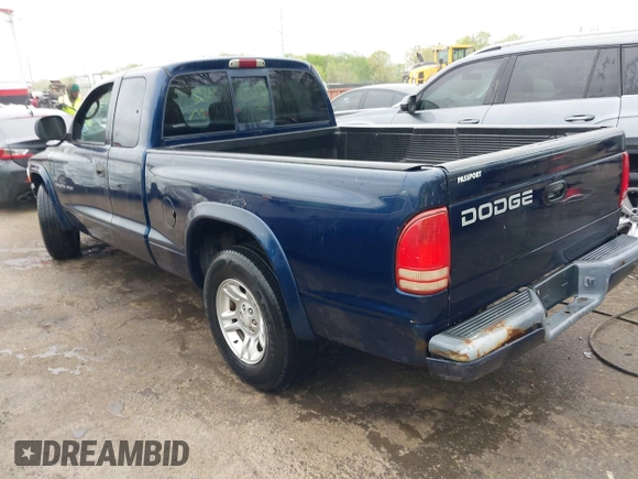 2002 Dodge Dakota Sport with VIN 1B7GL32X12S561414, listed as a IAAI auction lot 42060300 with 235,957 mi miles. Bid and sale history available at carsss.com. Image 3.