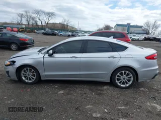 2019 Ford Fusion Hybrid SE with VIN 3FA6P0LU9KR104886, listed as a IAAI auction lot 41742835 with 1 mi miles. Bid and sale history available at carsss.com. Image 13.