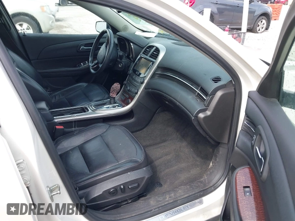 2013 Chevrolet Malibu LTZ with VIN 1G11J5SX6DF348664, listed as a IAAI auction lot 41994207 with 202,008 mi miles and . Bid and sale history available at DreamBid. Image 5.