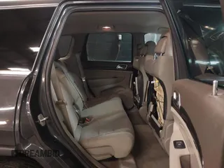 2011 Jeep Grand Cherokee 70th Anniversary with VIN 1J4RR4GG3BC566690, listed as a IAAI auction lot 41810545 with 173,886 mi miles. Bid and sale history available at carsss.com. Image 8.