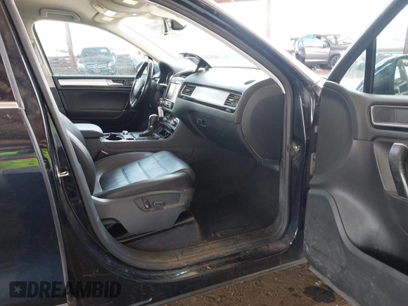 2016 Volkswagen Touareg Sport with VIN WVGEF9BP0GD012148, listed as a IAAI auction lot 42195030 with 95,984 mi miles and . Bid and sale history available at DreamBid. Image 5.