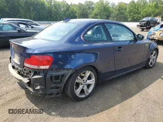 2011 BMW 1 Series 128i with VIN WBAUP7C57BVP21318, listed as a Copart auction lot 60479055 with 102,151 mi miles and Salvage title. Bid and sale history available at DreamBid. Image 3.