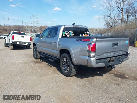 2020 Toyota Tacoma SR5 with VIN 3TMCZ5AN3LM320411, listed as a IAAI auction lot 41838498 with 50,252 mi miles and . Bid and sale history available at DreamBid. Image 3.