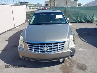 2007 Cadillac DTS Luxury I z VIN 1G6KD57Y97U198072, wystawiony jako IAAI lot #42315865 z przebiegiem 141 272 mil mil oraz . Historia ofert i sprzedaży dostępna na DreamBid. Obrazek 12.