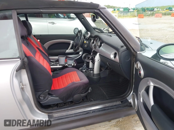 2006 MINI Convertible S with VIN WMWRH33556TL93023, listed as a IAAI auction lot 42744691 with 128,192 mi miles and . Bid and sale history available at DreamBid. Image 5.