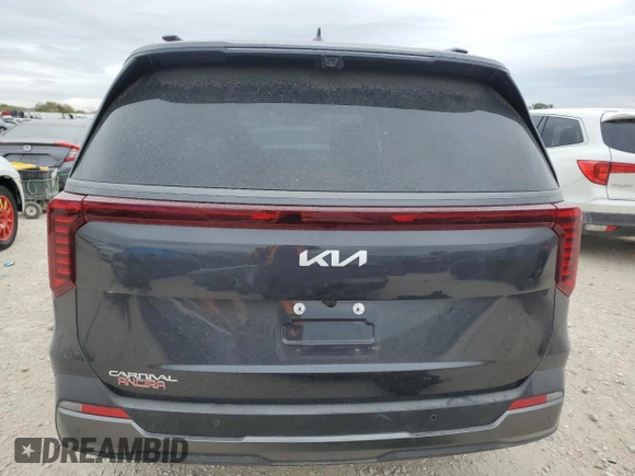 2025 Kia Carnival SX with VIN KNDNE5K37S6460882, listed as a Copart auction lot 82838604 with 1,978 mi miles and Salvage Title. Bid and sale history available at carsss.com. Image 6.