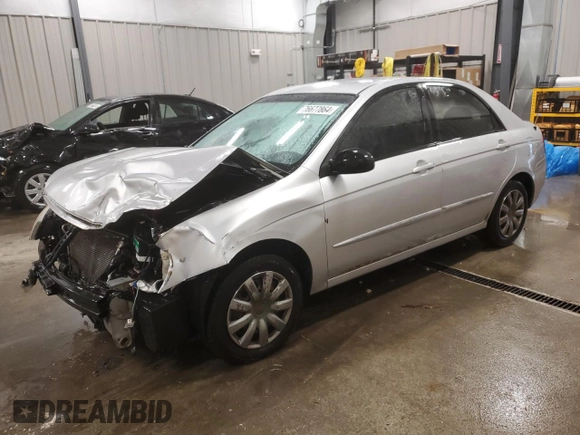 2005 Kia Spectra LX with VIN KNAFE121655148281, listed as a Copart auction lot 76677864 with 115,299 mi miles and Clean Title. Bid and sale history available at carsss.com. Image 1.