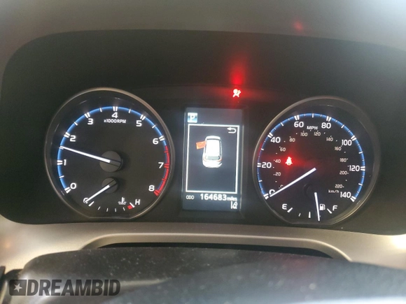 2018 Toyota RAV4 LE with VIN JTMBFREV2JJ182828, listed as a Copart auction lot 55668945 with 164,683 mi miles and Salvage Title. Bid and sale history available at DreamBid. Image 9.