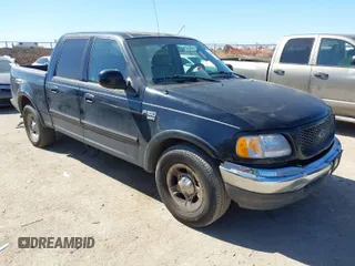2003 Ford F-150 XLT with VIN 1FTRW07L83KC62296, listed as a IAAI auction lot 41689891 with 272,210 mi miles. Bid and sale history available at carsss.com. Image 1.