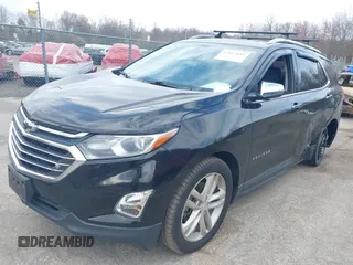 2018 Chevrolet Equinox Premier with VIN 2GNAXWEX6J6302935, listed as a IAAI auction lot 42065883 with 61,983 mi miles and . Bid and sale history available at carsss.com. Image 17.