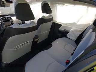 2022 Toyota Prius L Eco with VIN JTDKAMFU0N3176835, listed as a IAAI auction lot 41995548 with 47,945 mi miles and . Bid and sale history available at DreamBid. Image 8.