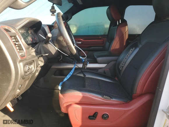 2019 Ram 1500 Rebel with VIN 1C6RRFEG4KN801503, listed as a Copart auction lot 77121894 with 228,484 mi miles and Non Repairable. Bid and sale history available at carsss.com. Image 7.