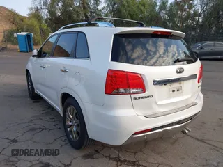 2012 Kia Sorento SX with VIN 5XYKW4A29CG224803, listed as a IAAI auction lot 41493527 with 228,065 mi miles. Bid and sale history available at carsss.com. Image 3.