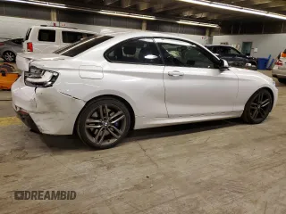 2015 BMW 2 Series 228i with VIN WBA1F5C53FV343580, listed as a Copart auction lot 84035754 with 63,537 mi miles and Salvage Title. Bid and sale history available at carsss.com. Image 3.