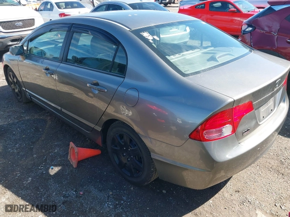 2006 Honda Civic Sdn LX with VIN 1HGFA16516L060197, listed as a IAAI auction lot 41855242 with 204,499 mi miles. Bid and sale history available at carsss.com. Image 3.