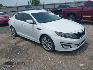 2015 Kia Optima SX Turbo with VIN 5XXGR4A61FG438242, listed as a IAAI auction lot 42344818 with 157,098 mi miles and . Bid and sale history available at DreamBid. Image 1.