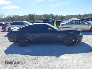2005 Ford Mustang Deluxe with VIN 1ZVFT80N655136118, listed as a IAAI auction lot 41811969 with 104,071 mi miles. Bid and sale history available at carsss.com. Image 13.
