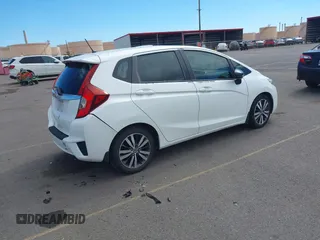 2015 Honda Fit EX-L with VIN 3HGGK5H8XFM753011, listed as a IAAI auction lot 41878734 with 121,514 mi miles and . Bid and sale history available at DreamBid. Image 4.